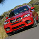 Illustration for article titled BMW X5 M, X6 M: 555 HP All-Wheel-Drive Super-Soft-Roaders!